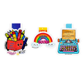 Collection of three colorful magnetic bookmarks featuring smiling crayons in a pencil holder with the phrase "Create Your World," a rainbow reading "Cool Kids Read Books," and a vintage typewriter with an inspiring quote celebrating reading and writing.